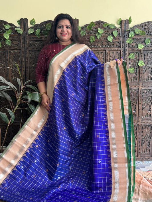 Gadwal Silk Saree Ink Blue Colored Complemented With a Beige Zari Border