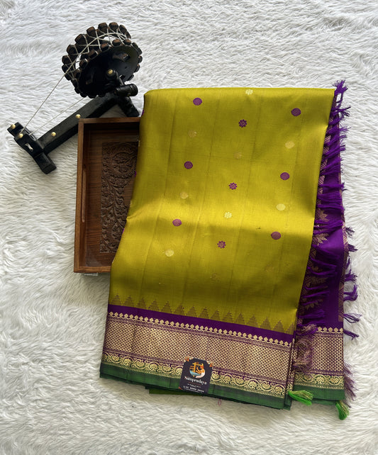 Gadwal Pattu Saree Mustard Yellow Colored Complemented With a Zari Border - Sampradaya Designer Studio