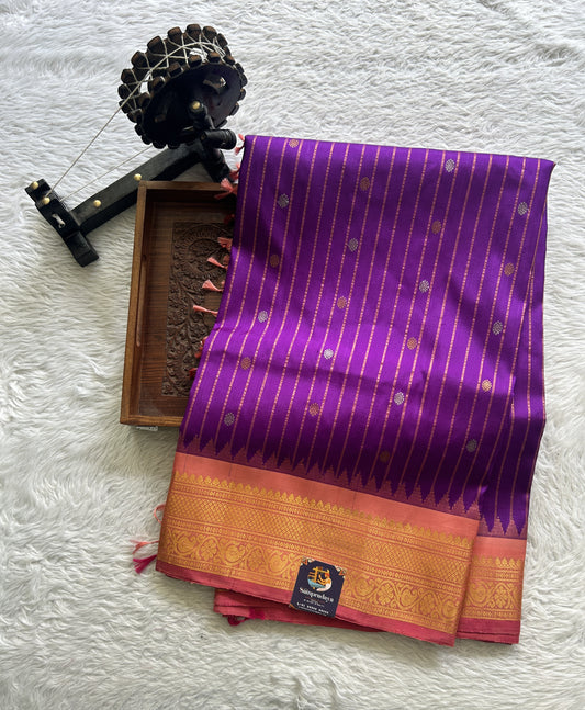 Gadwal Pattu Saree Purple Colored Complemented With a Zari Border - Sampradaya Designer Studio