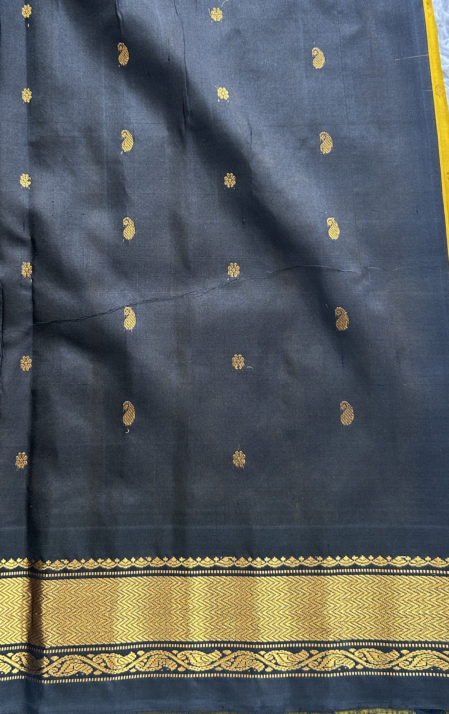 Gadwal Pattu Saree Turmeric Yellow Colored Complemented With a Zari Border - Sampradaya Designer Studio