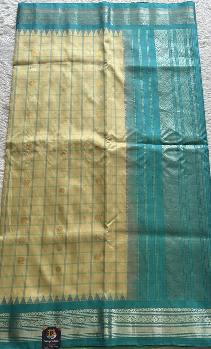 Gadwal Pattu Saree Cream Colored Complemented With a Zari Border - Sampradaya Designer Studio