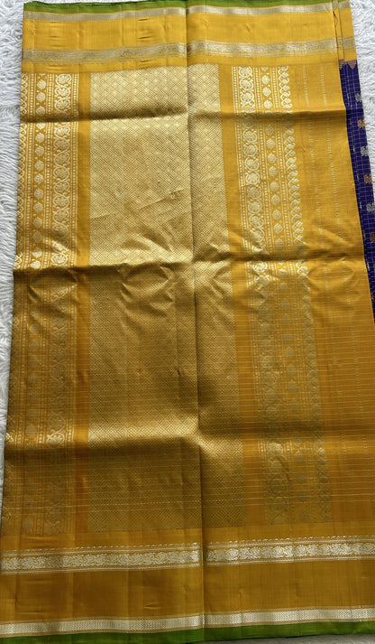 Gadwal Pattu Saree Violet Colored Complemented With a Zari Border - Sampradaya Designer Studio