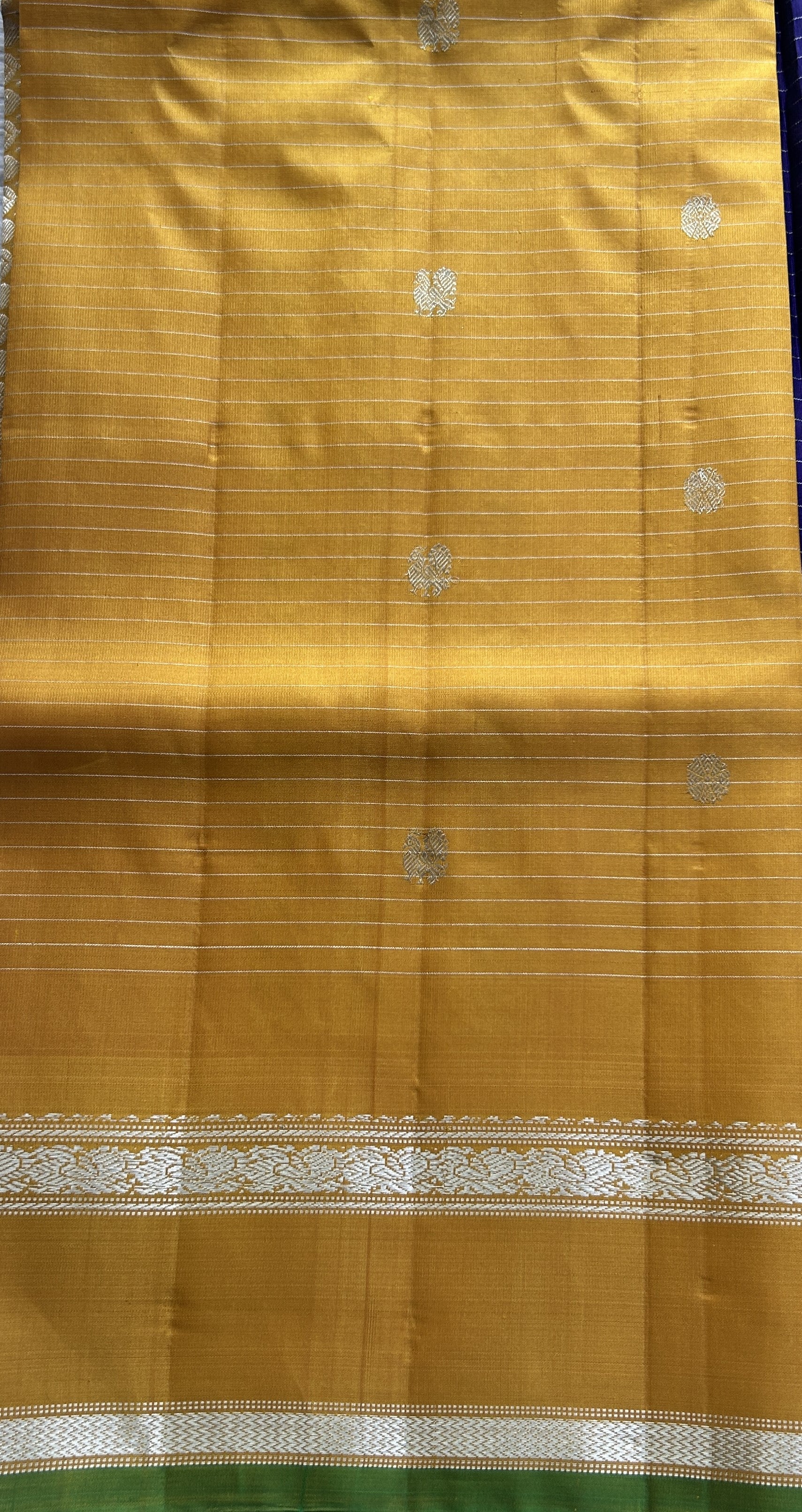 Gadwal Pattu Saree Violet Colored Complemented With a Zari Border - Sampradaya Designer Studio