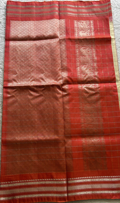 Gadwal Pattu Saree Cream Colored Complemented With a Zari Border - Sampradaya Designer Studio