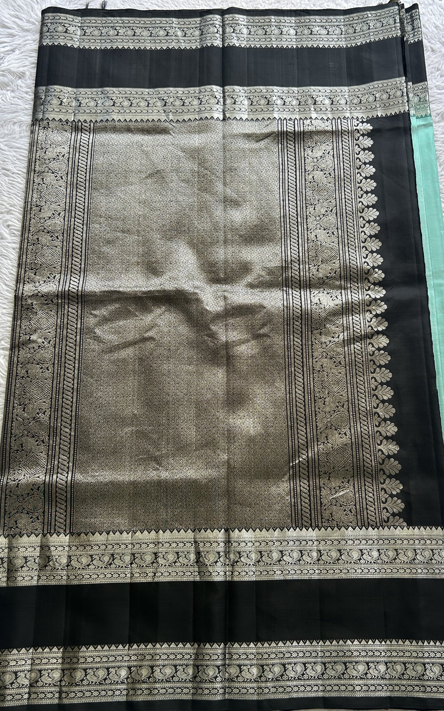 Gadwal Pattu Saree Sea Green Colored Complemented With a Zari Border - Sampradaya Designer Studio