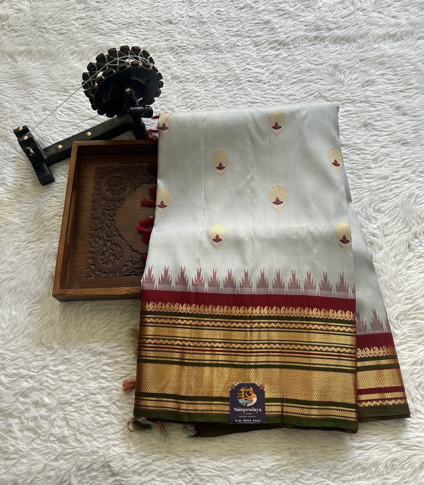 Gadwal Pattu Saree Gray Colored Complemented With a Maroon Color Zari Border - Sampradaya Designer Studio