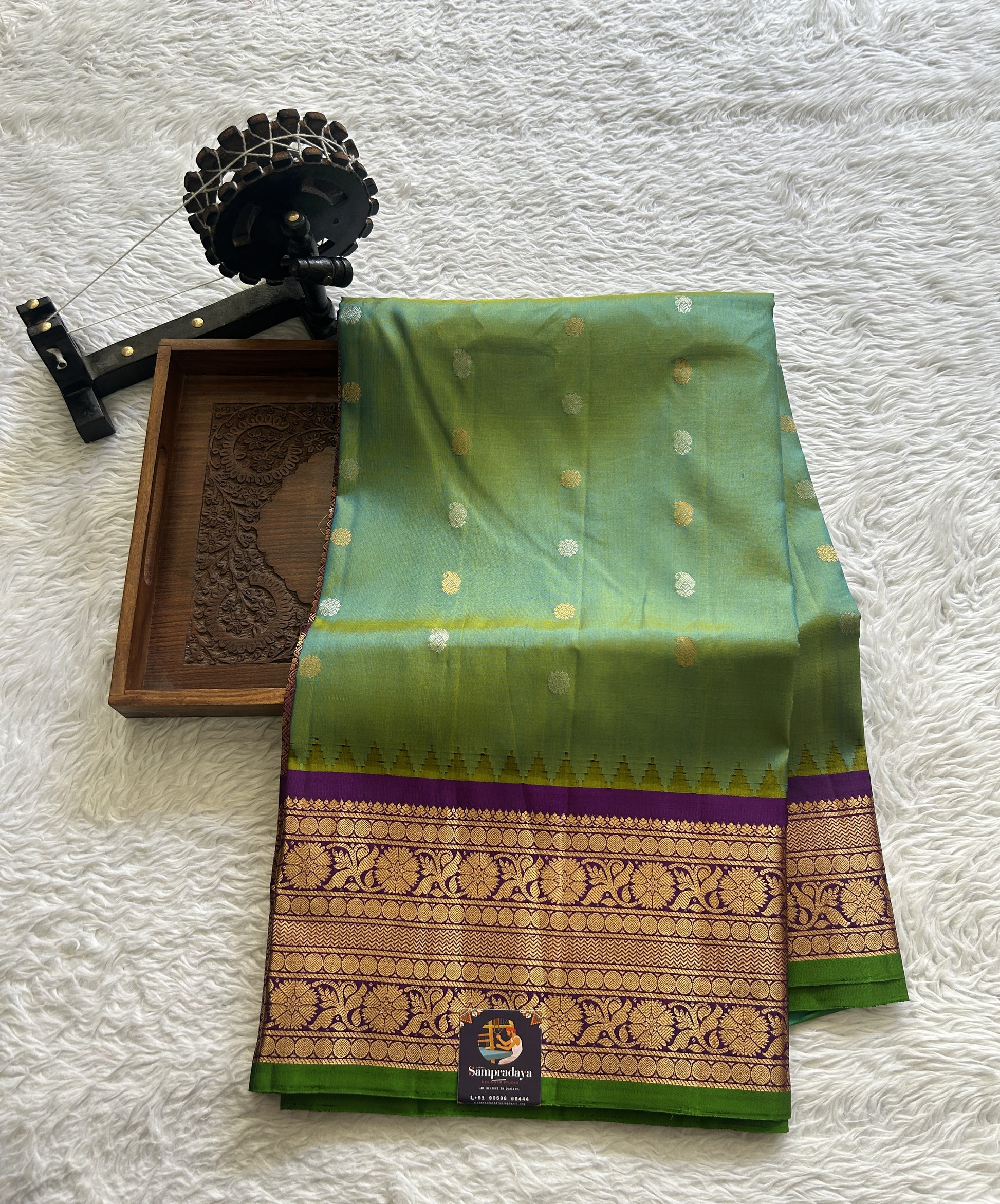 Gadwal Pattu Saree Rama Green Colored Complemented With a Violet Color Zari Border - Sampradaya Designer Studio