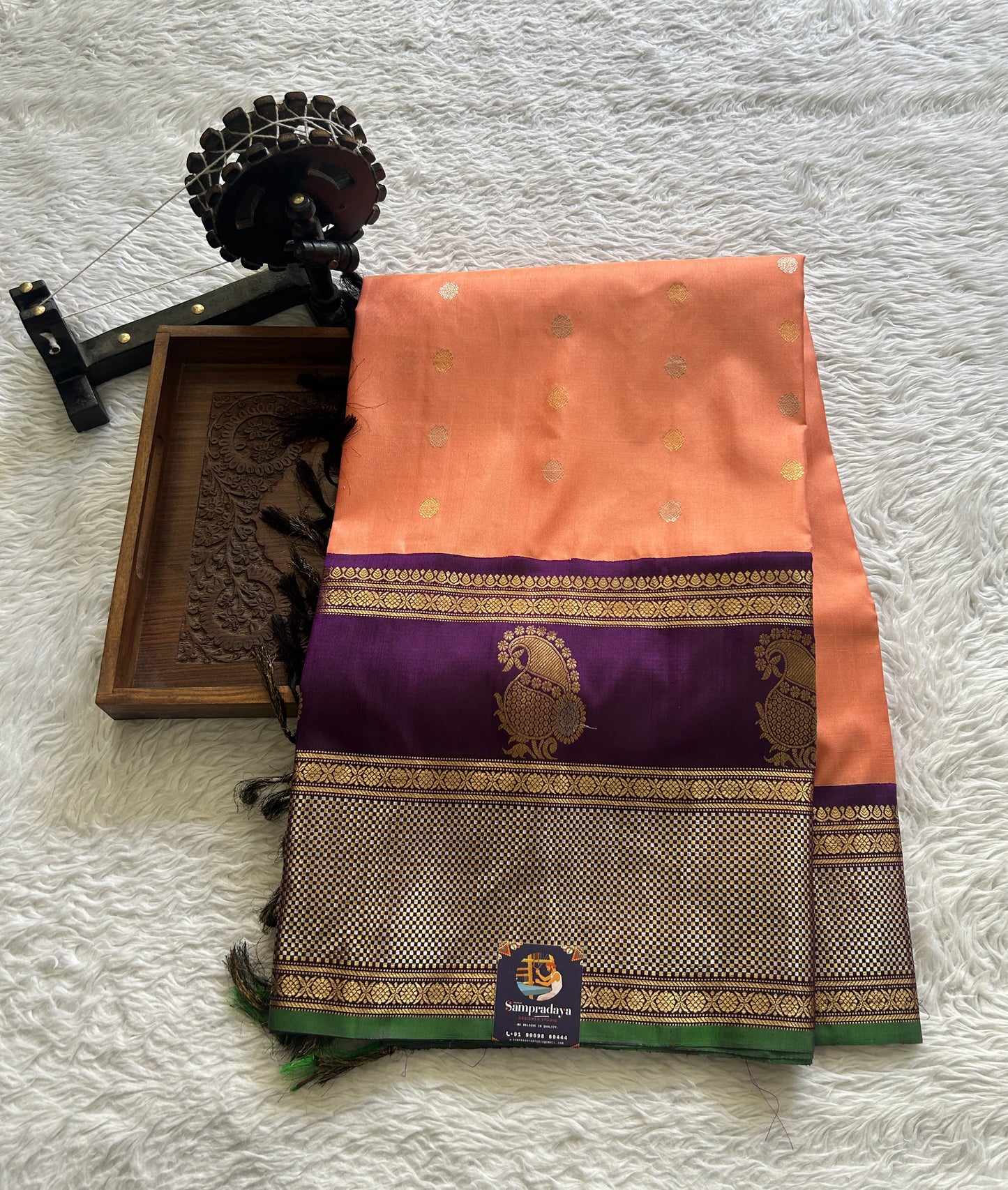 Gadwal Pattu Saree Peach Colored Complemented With a Purple Color Zari Border - Sampradaya Designer Studio