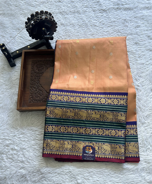 Gadwal Pattu Saree Light Orange Colored Complemented With a Ink Blue Color Zari Border - Sampradaya Designer Studio