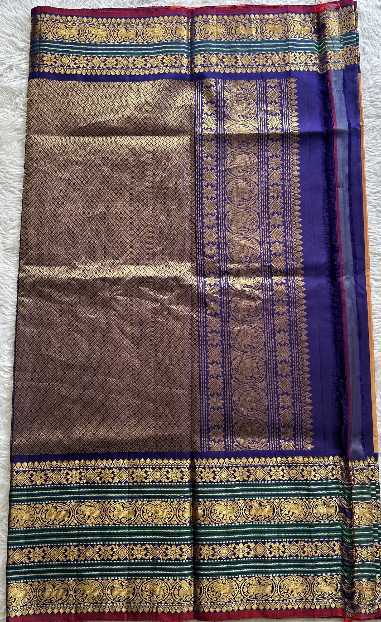 Gadwal Pattu Saree Light Orange Colored Complemented With a Ink Blue Color Zari Border - Sampradaya Designer Studio