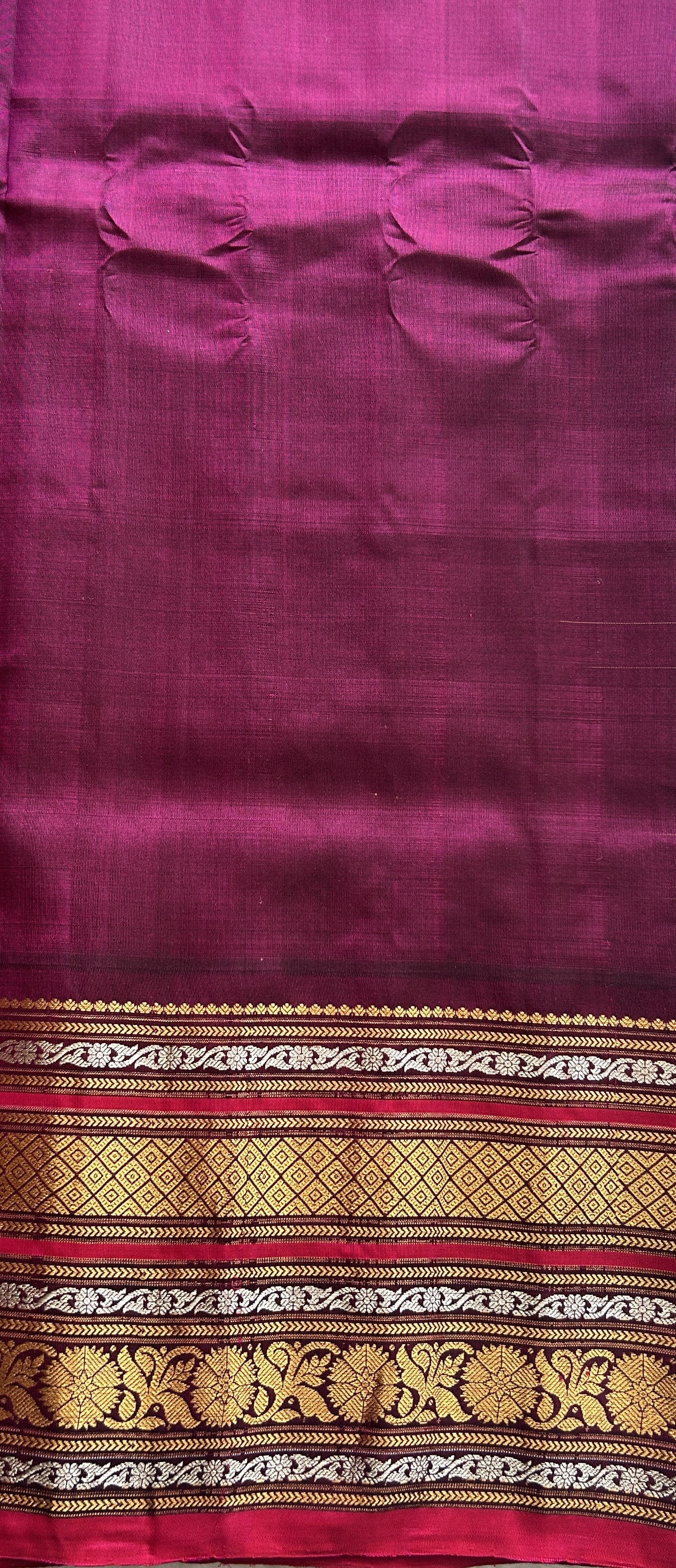 Gadwal Pattu Saree Green Colored Complemented With a Dark Pink Color Zari Border - Sampradaya Designer Studio