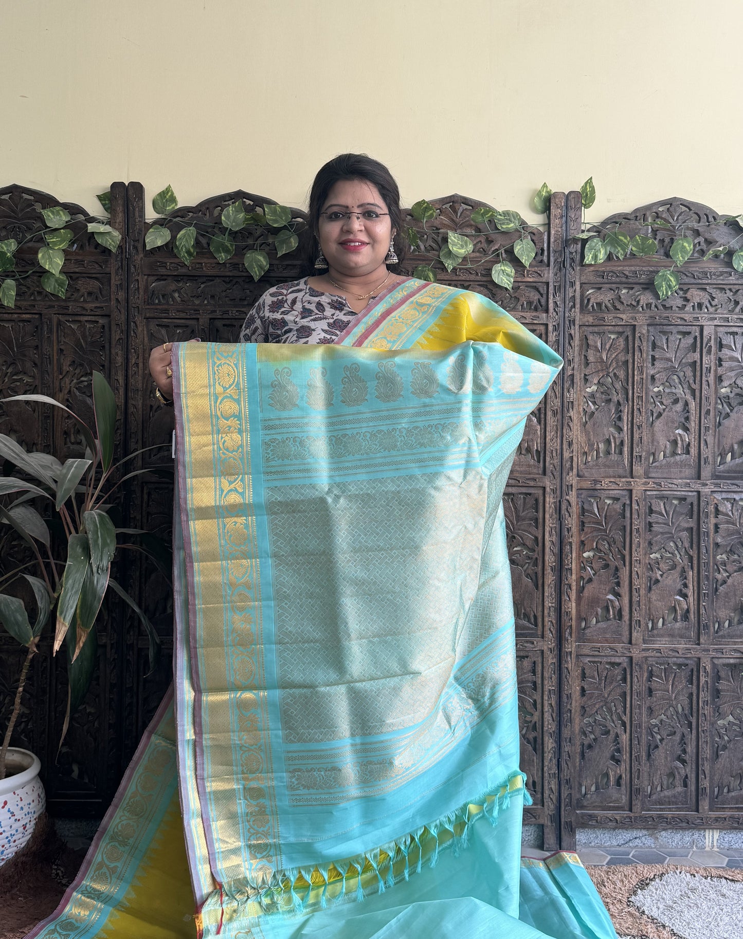 Gadwal Silk Saree Yellow Colored Complemented With a Kanchi Border