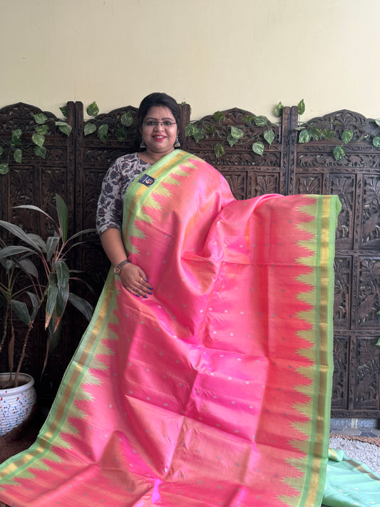 Gadwal Silk Saree Pink Colored Complemented With a Sea Green Crown Border