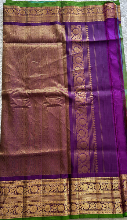 Gadwal Pattu Saree Rama Green Colored Complemented With a Violet Color Zari Border - Sampradaya Designer Studio