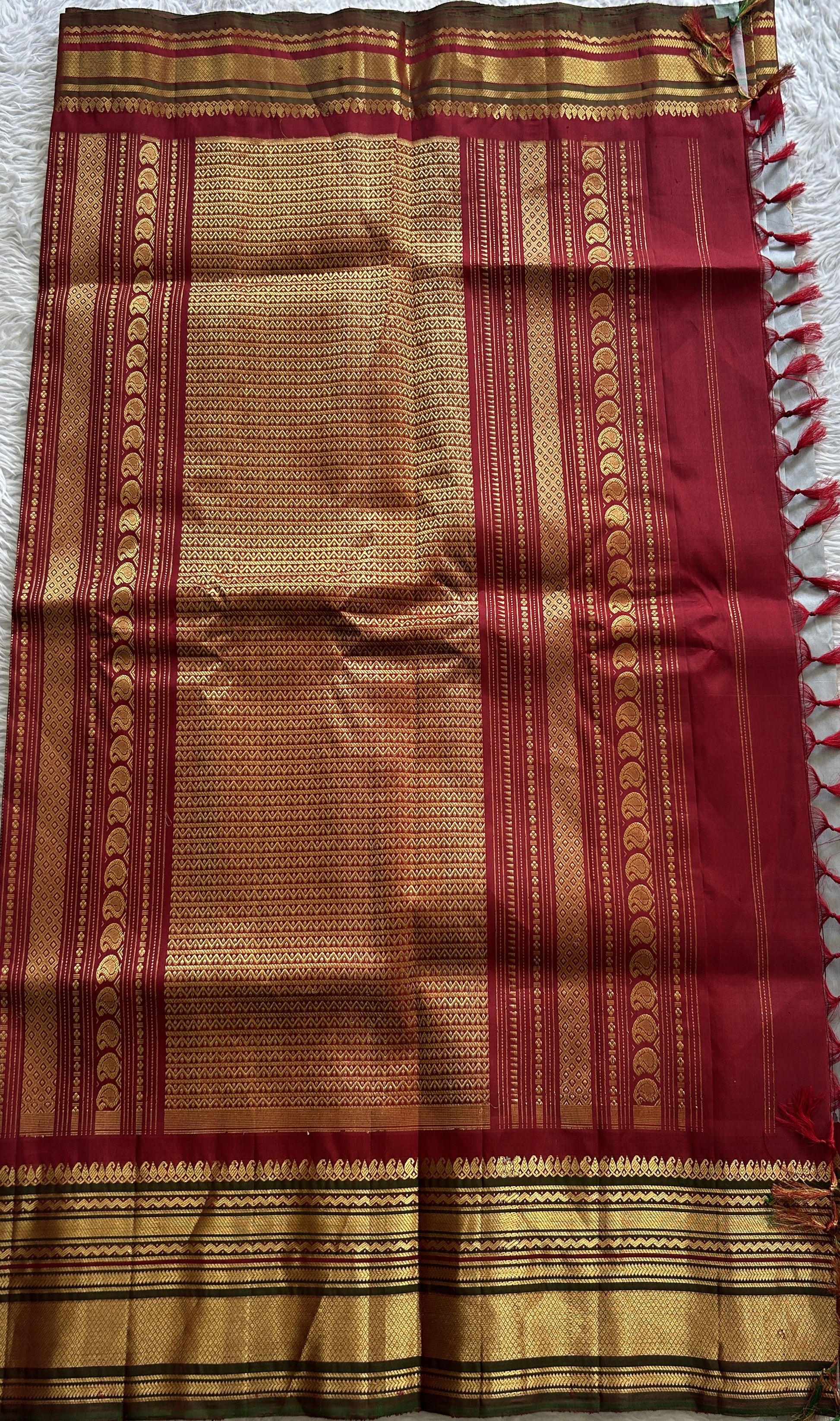 Gadwal Pattu Saree Gray Colored Complemented With a Maroon Color Zari Border - Sampradaya Designer Studio