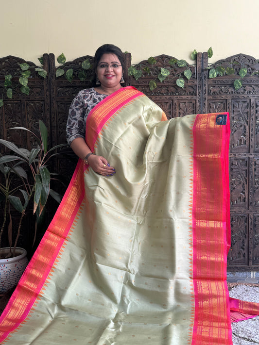 Gadwal Silk Saree Cream Colored Complemented With a Pink Zari Border