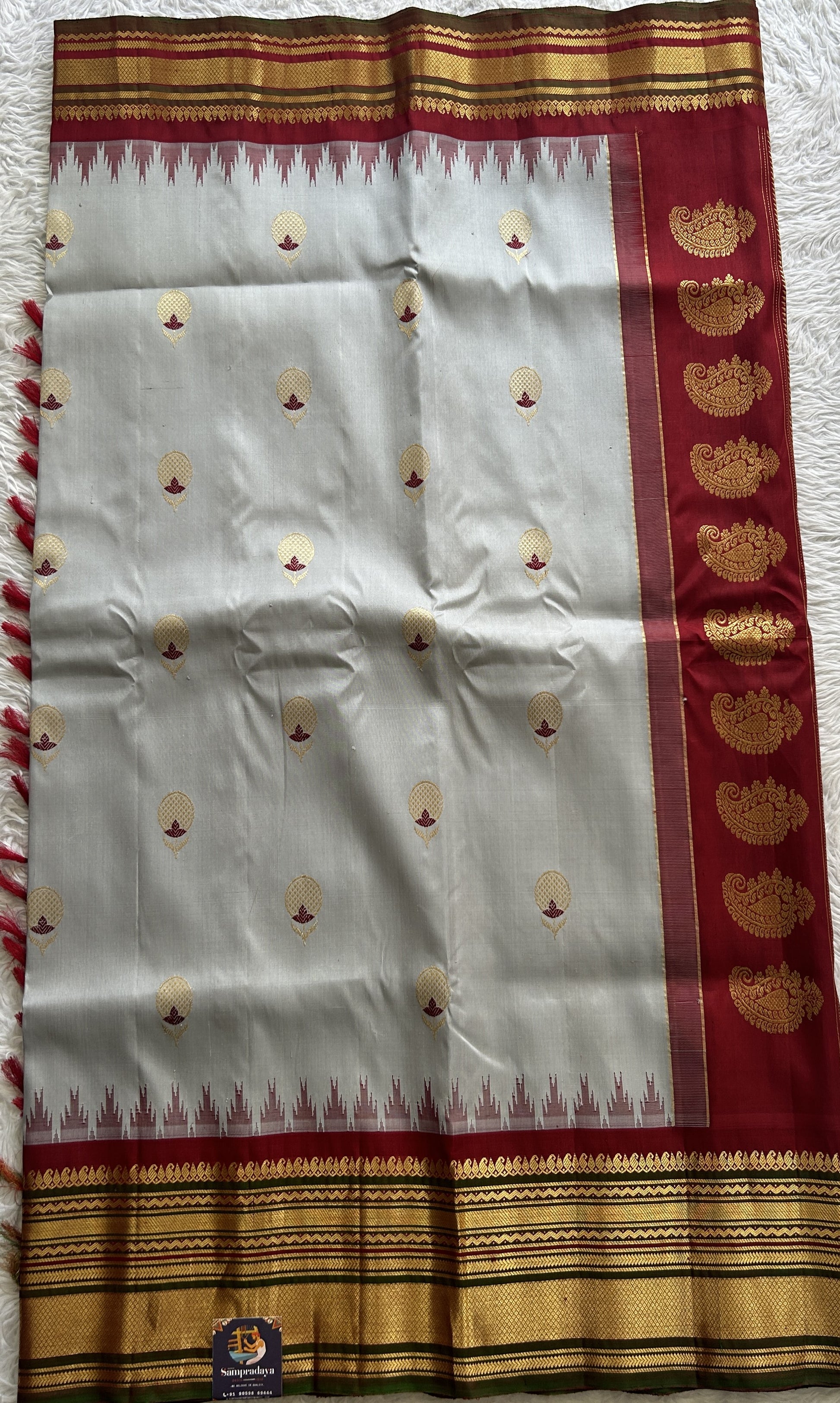 Gadwal Pattu Saree Gray Colored Complemented With a Maroon Color Zari Border - Sampradaya Designer Studio