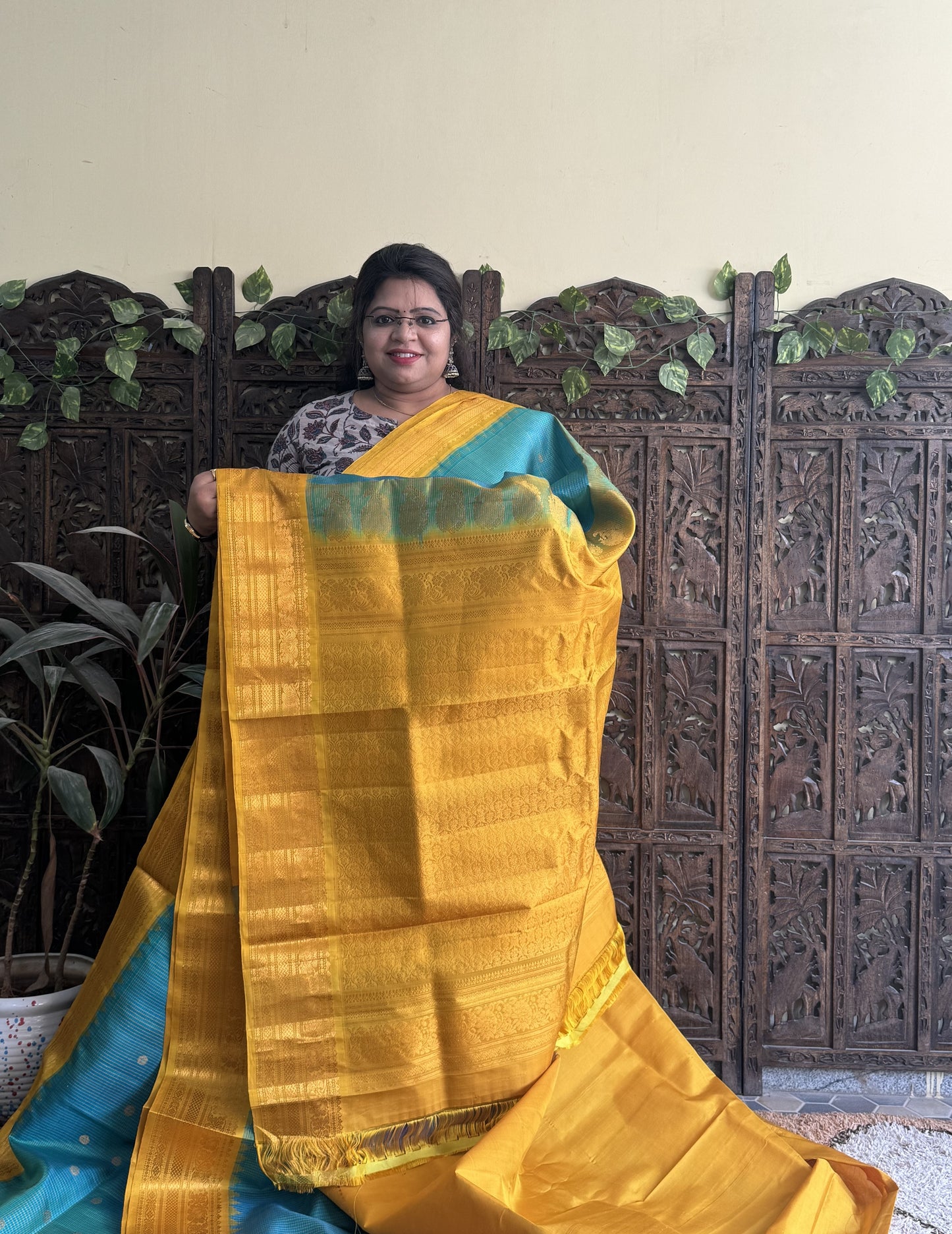 Gadwal Silk Saree Fern Colored Complemented With a Yellow Zari Border