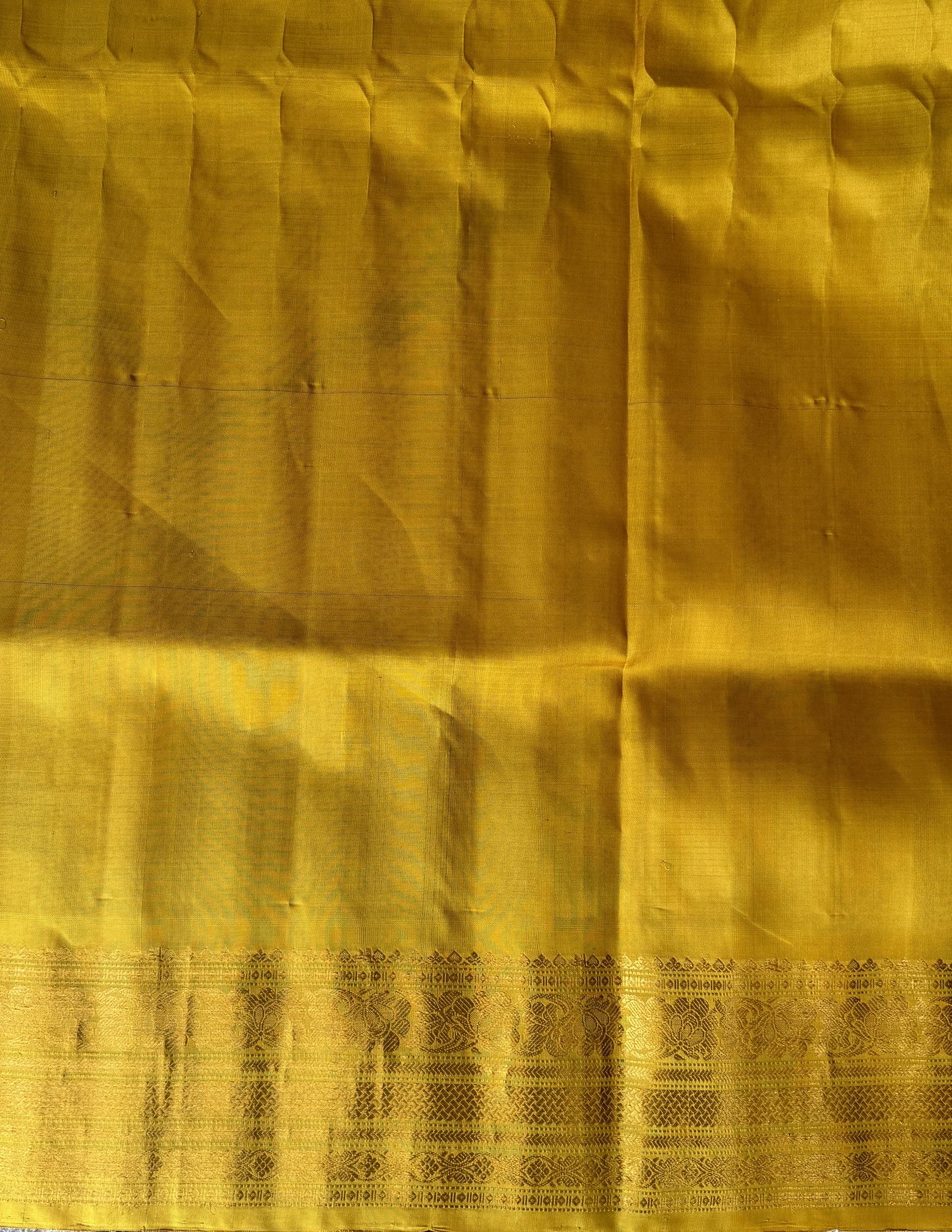 Gadwal Silk Saree Fern Colored Complemented With a Yellow Zari Border