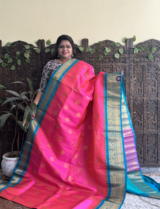 Gadwal Silk Saree Pink Colored Complemented With a Turquoise Blue Zari Border