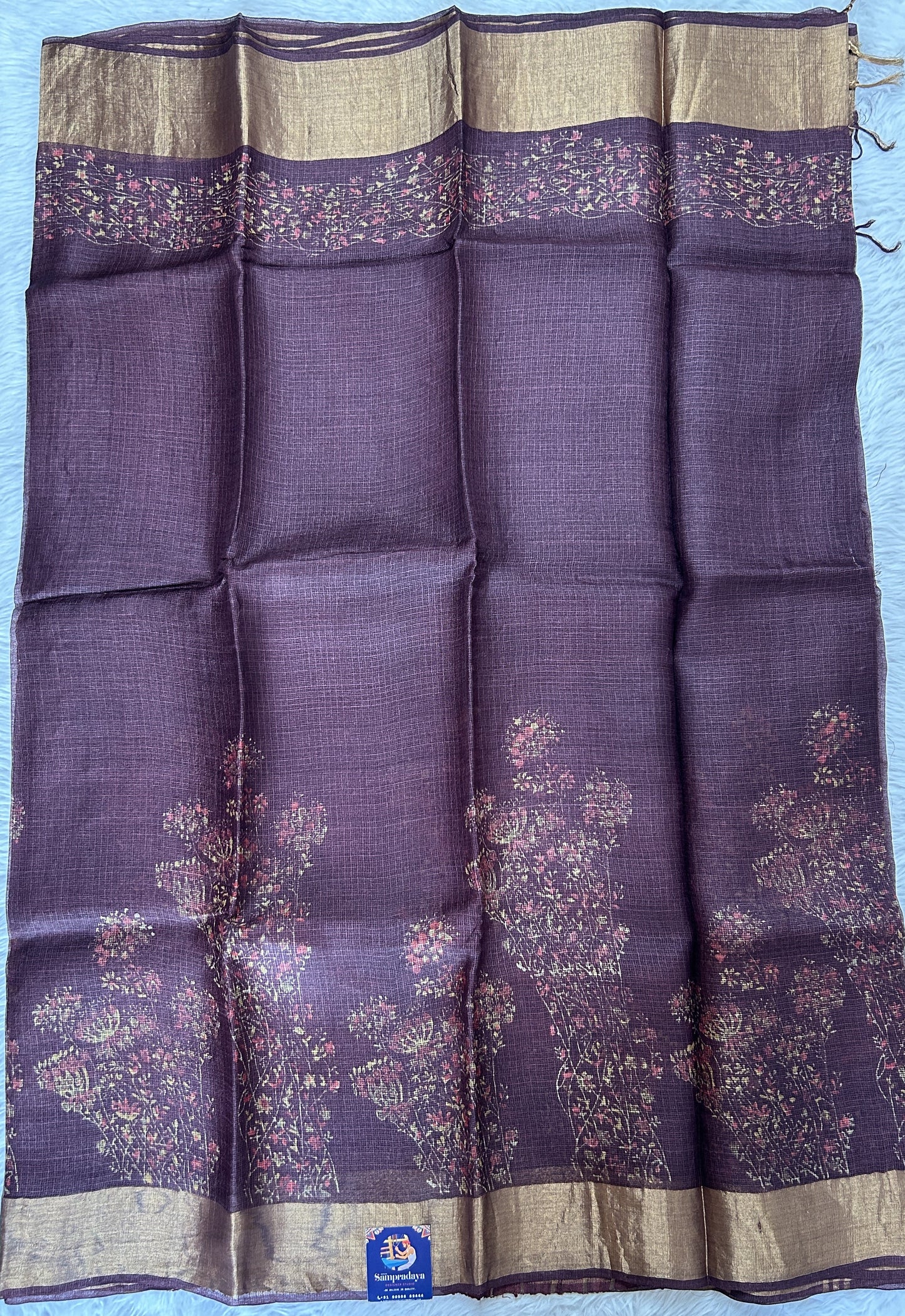 Tussar Silk Saree Brown colored complemented with a Gold Zari border. - Sampradaya Designer Studio