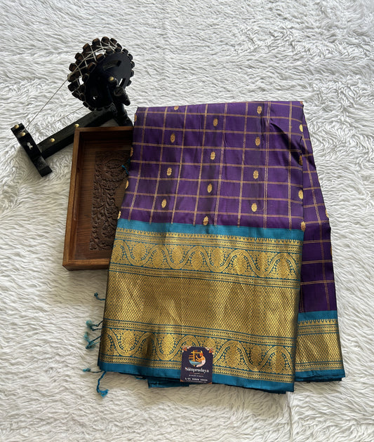 Gadwal Pattu Saree Violet Colored Complemented With a Turquoise Blue Zari Border - Sampradaya Designer Studio