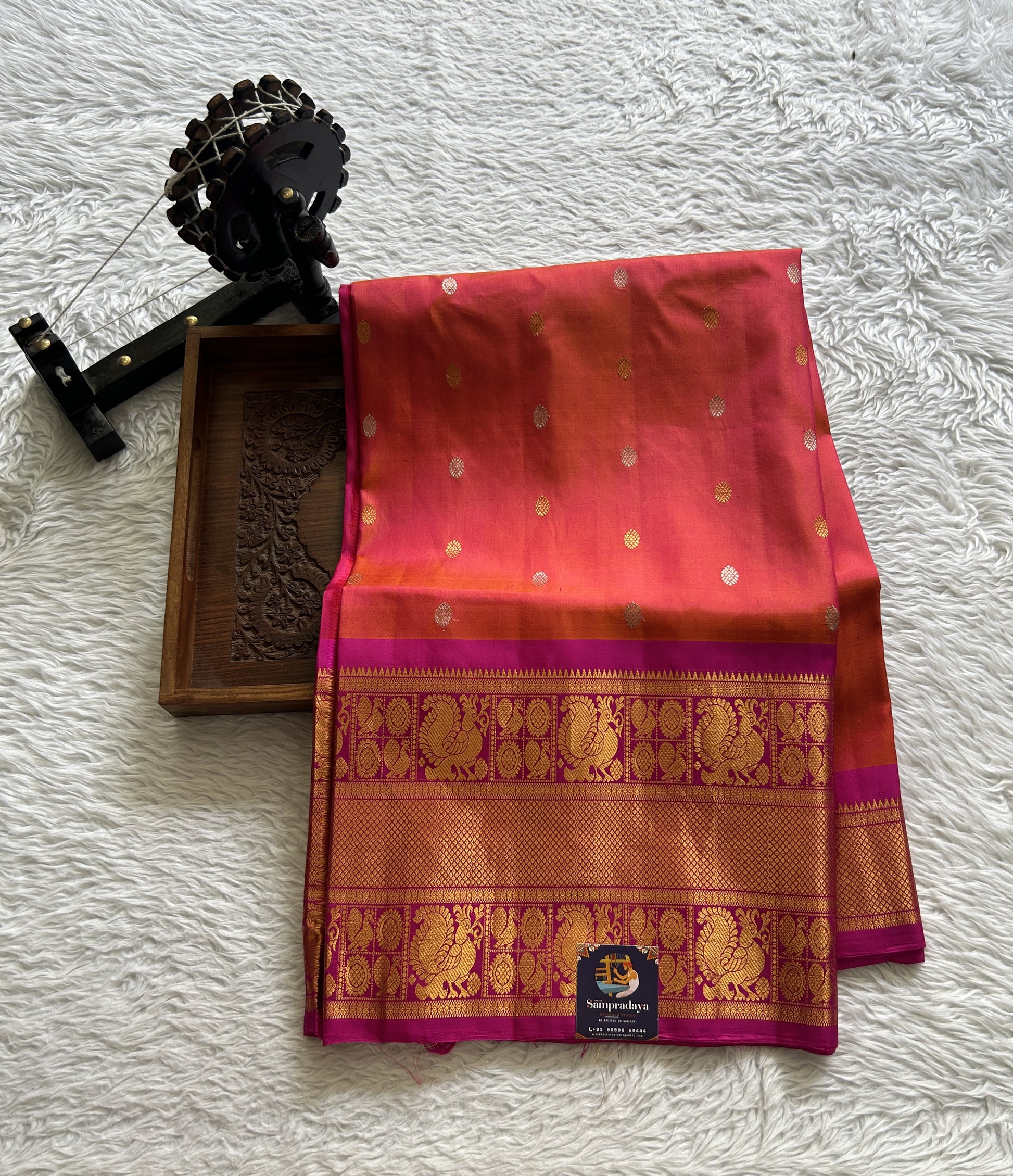 Gadwal Pattu Saree Dark Peach Colored Complemented With a Pink Color Zari Border - Sampradaya Designer Studio