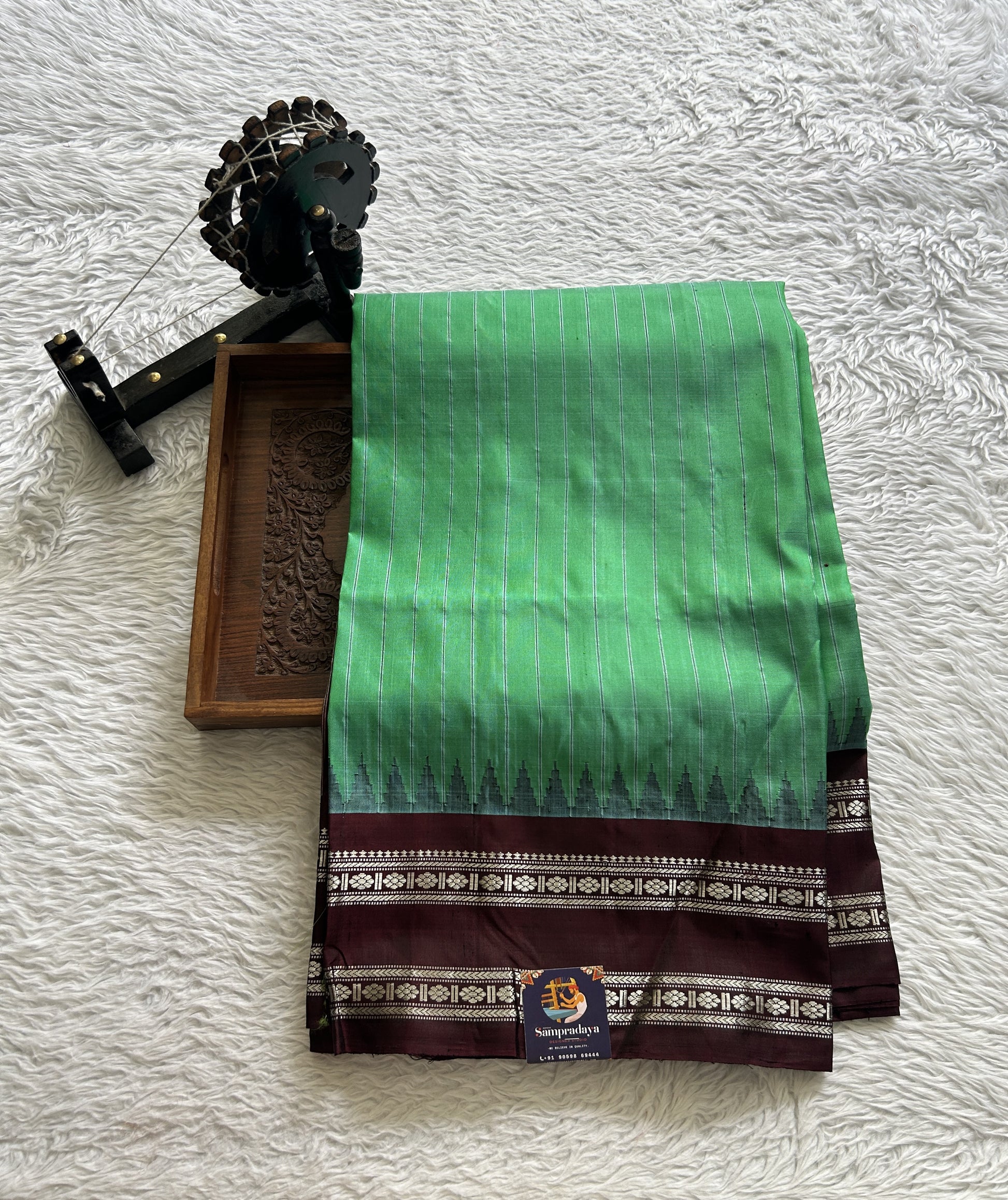 Gadwal Pattu Saree Dark Green Colored Complemented With a Brown Color Zari Border - Sampradaya Designer Studio