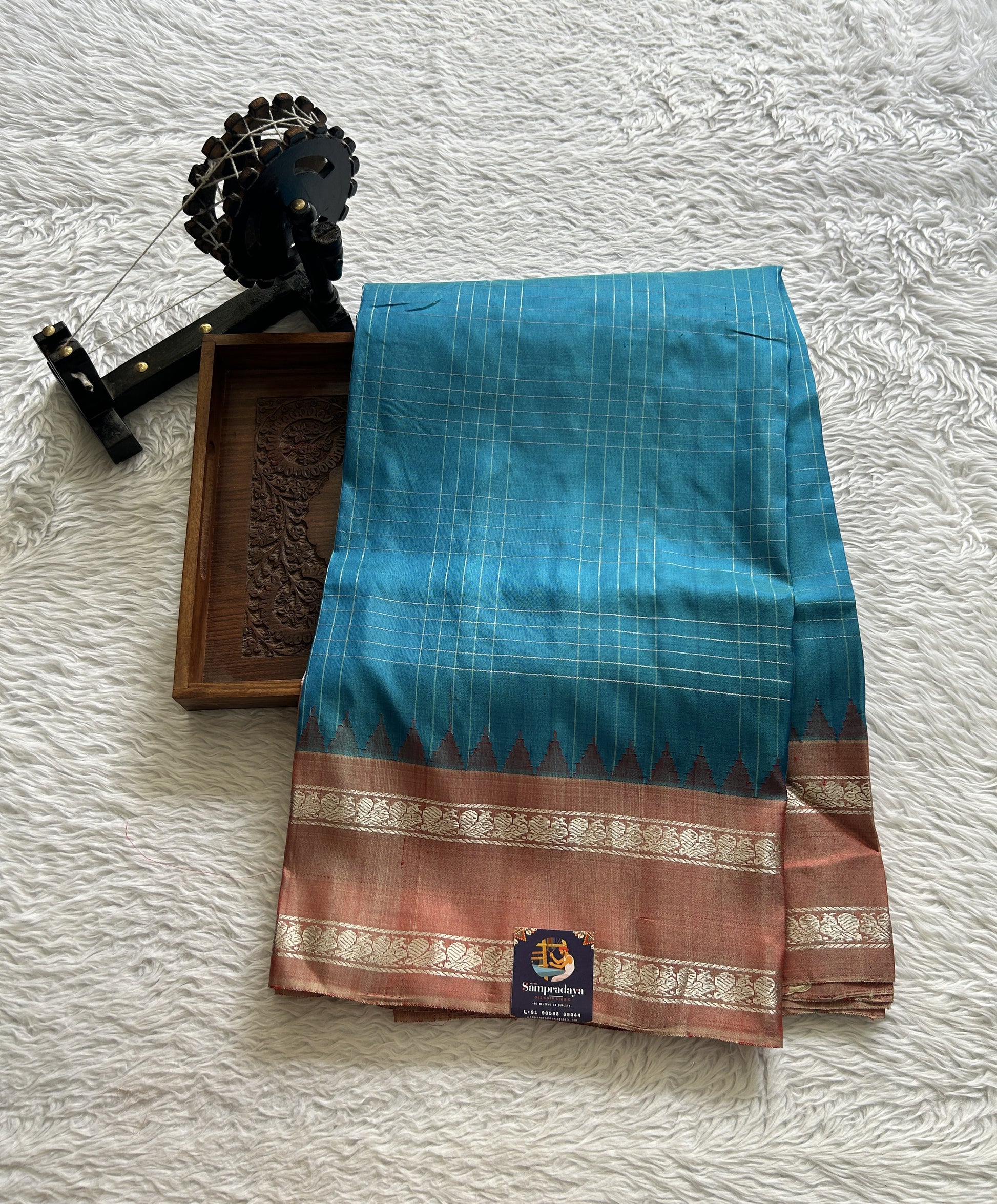 Gadwal Pattu Saree Sea Blue Colored Complemented With a Peach Color Zari Border - Sampradaya Designer Studio