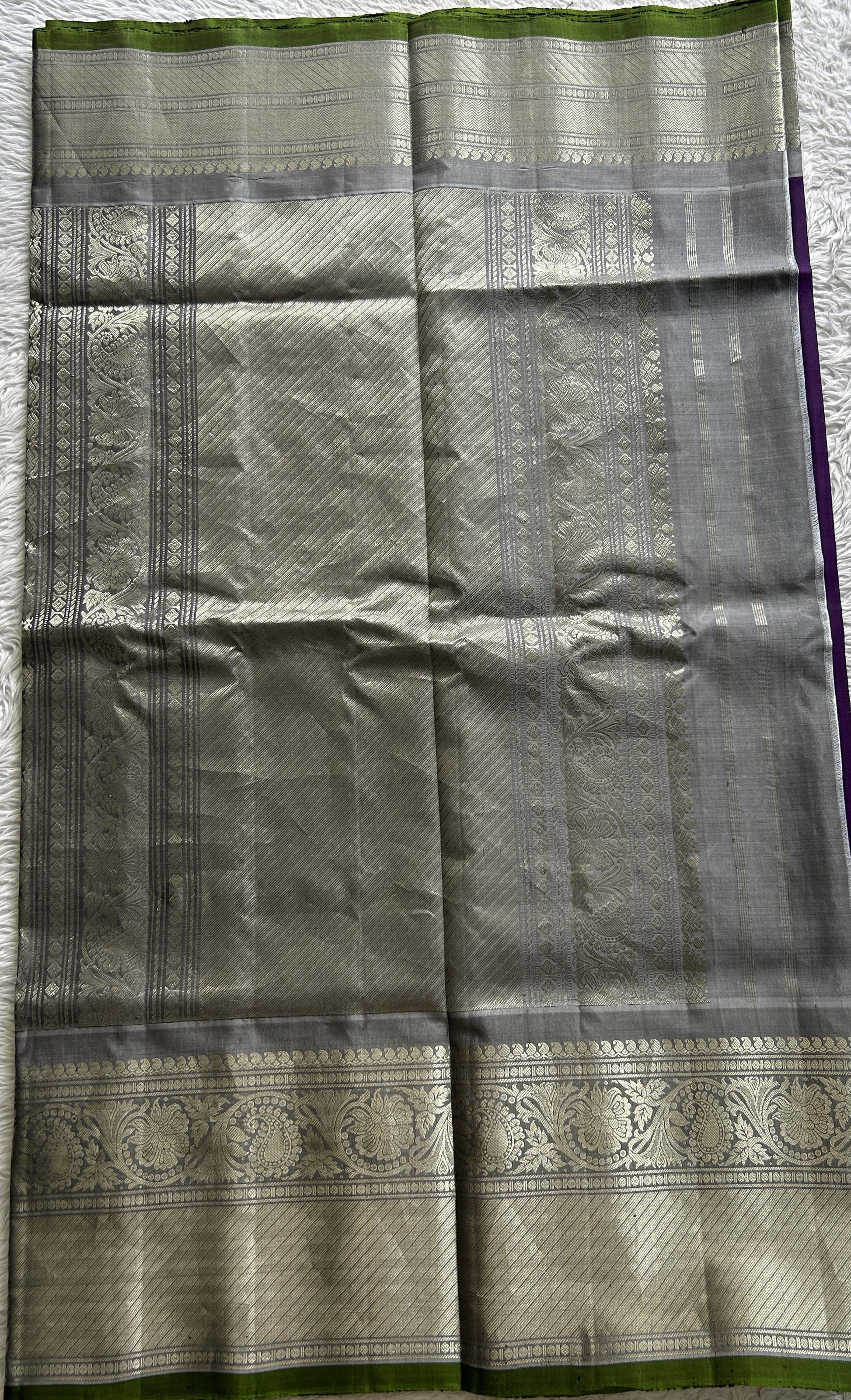 Gadwal Pattu Saree Purple Colored Complemented With a Gray Color Zari Border - Sampradaya Designer Studio