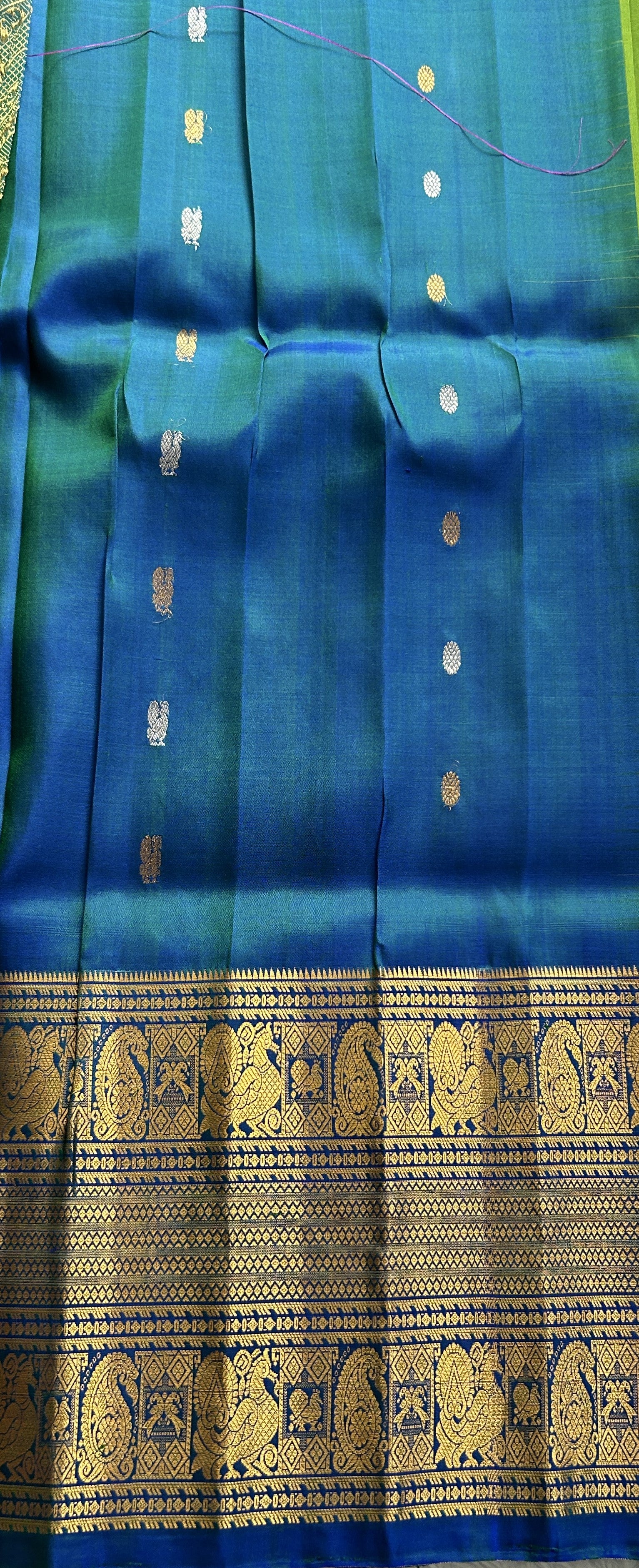 Gadwal Pattu Saree Parrot Green Colored Complemented With a Blue Color Zari Border - Sampradaya Designer Studio