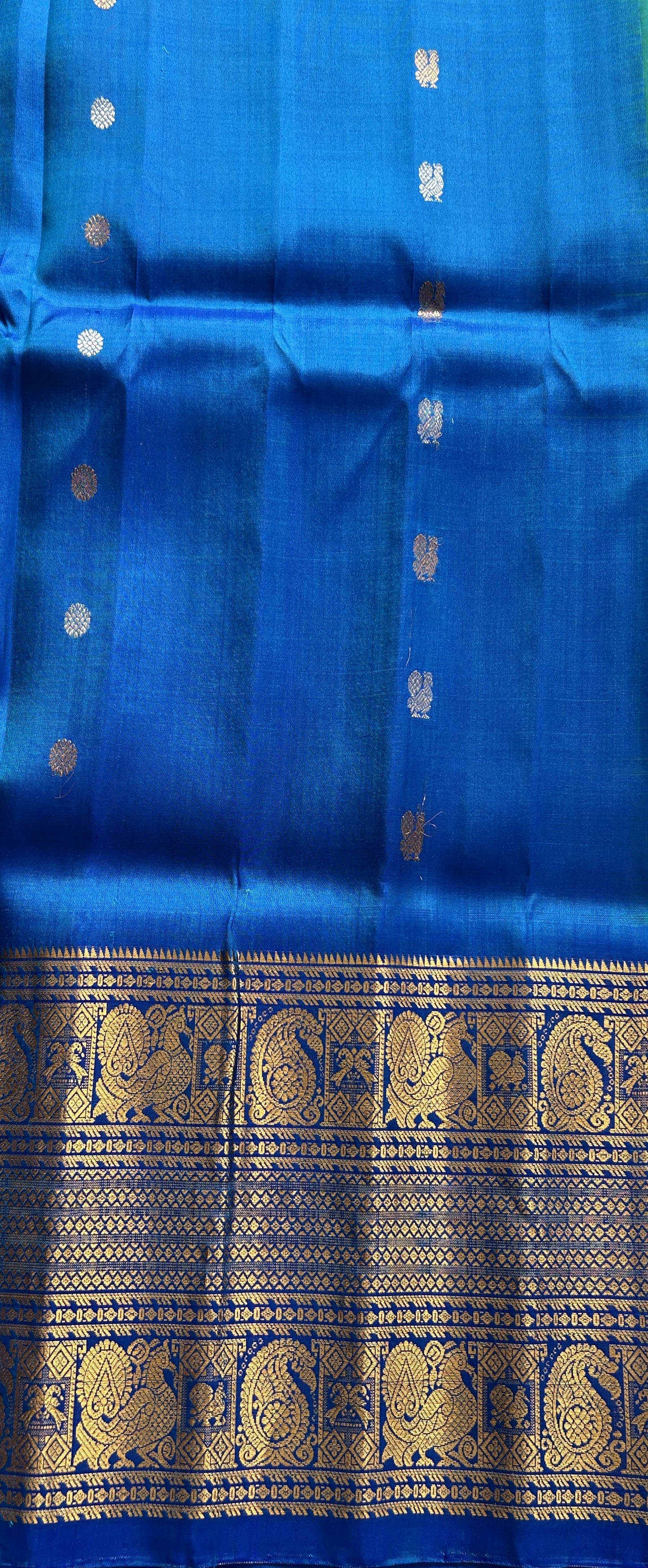 Gadwal Pattu Saree Aqua Green Colored Complemented With a Blue Color Zari Border - Sampradaya Designer Studio