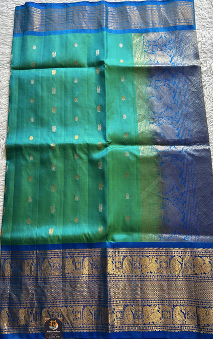 Gadwal Pattu Saree Aqua Green Colored Complemented With a Blue Color Zari Border - Sampradaya Designer Studio