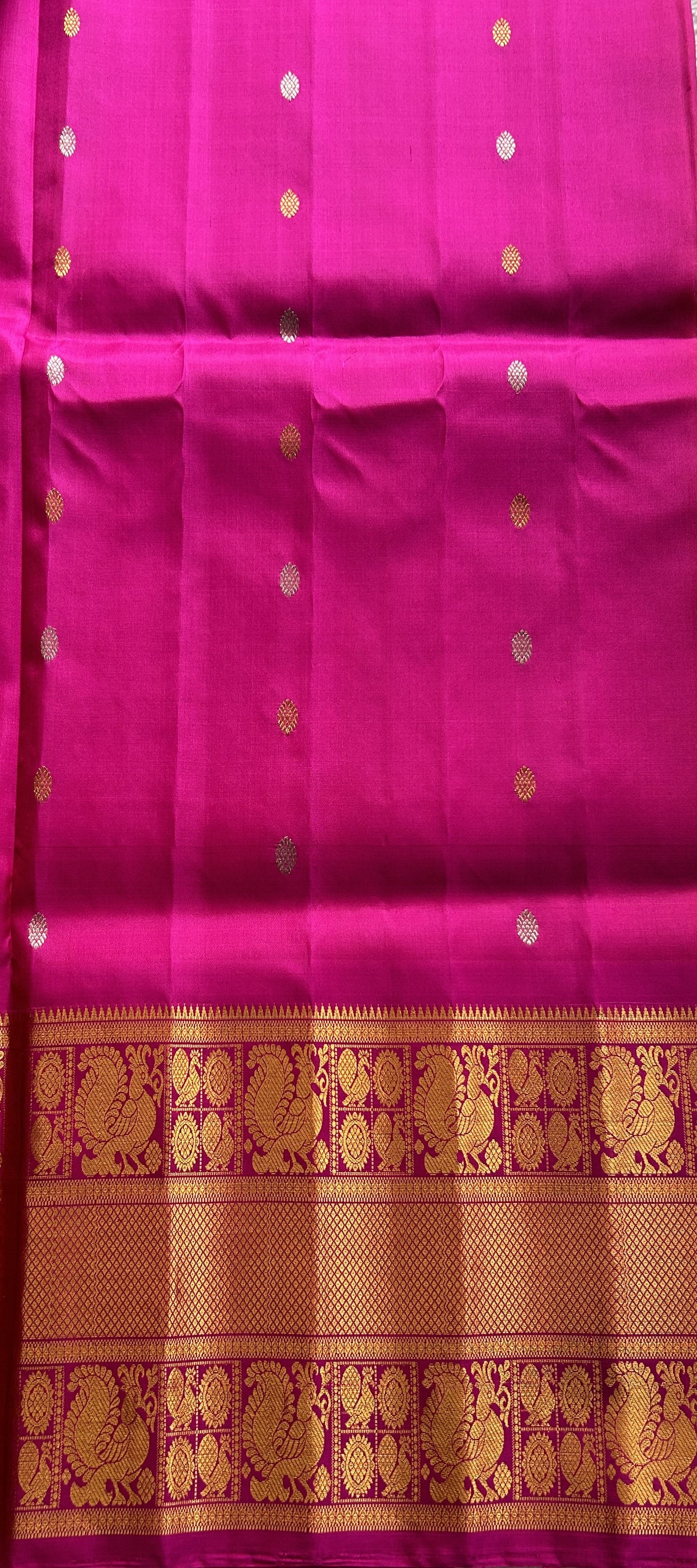 Gadwal Pattu Saree Dark Peach Colored Complemented With a Pink Color Zari Border - Sampradaya Designer Studio