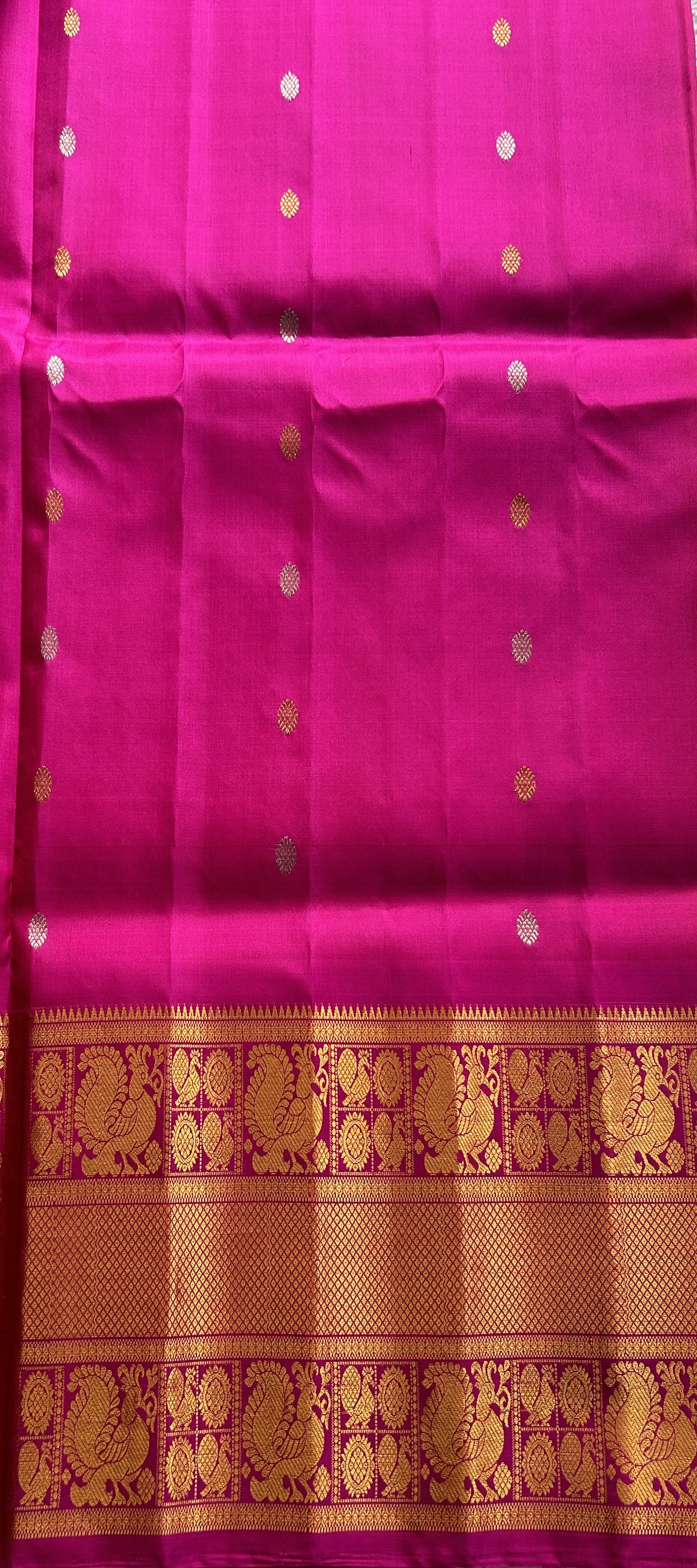 Gadwal Pattu Saree Dark Peach Colored Complemented With a Pink Color Zari Border - Sampradaya Designer Studio