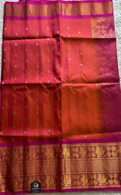 Gadwal Pattu Saree Dark Peach Colored Complemented With a Pink Color Zari Border - Sampradaya Designer Studio