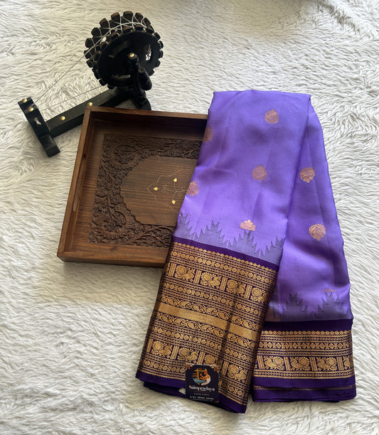 Gadwal Silk Saree Lavender Colored complemented with a Zari Border. - Sampradaya Designer Studio