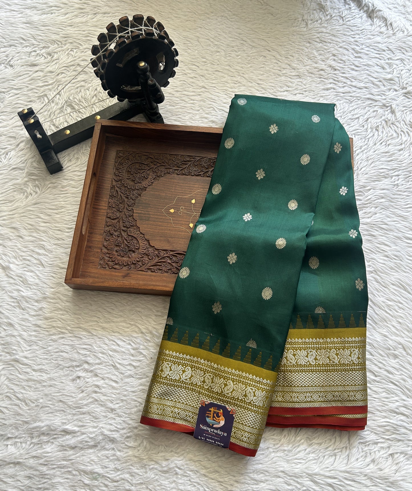 Gadwal Silk Saree Bottle Green Colored complemented with a Olive Green Color Zari Border. - Sampradaya Designer Studio