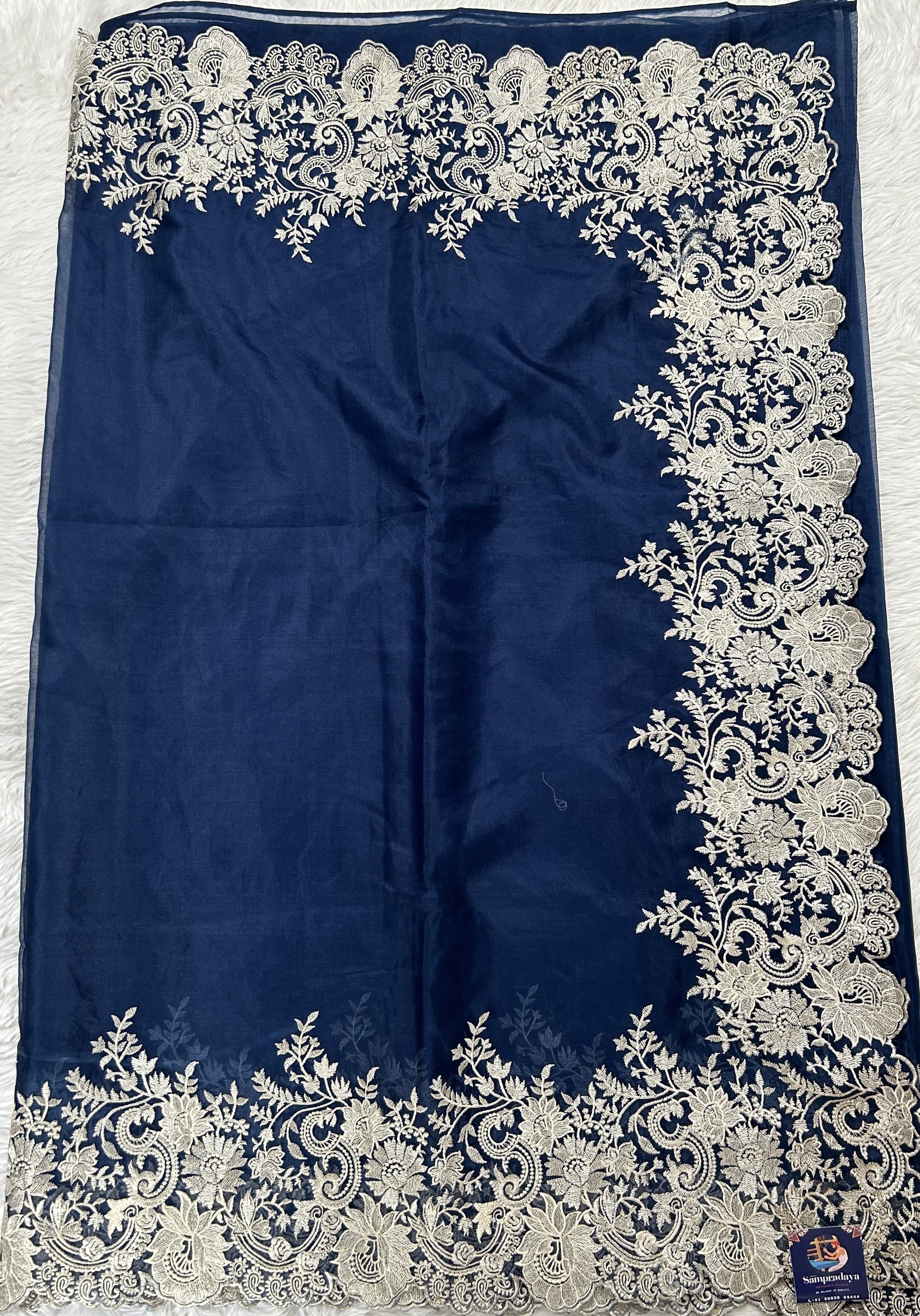 Soft Organza Designer Saree Blue colored Saree complemented with a Machine Embroidery border. - Sampradaya Designer Studio