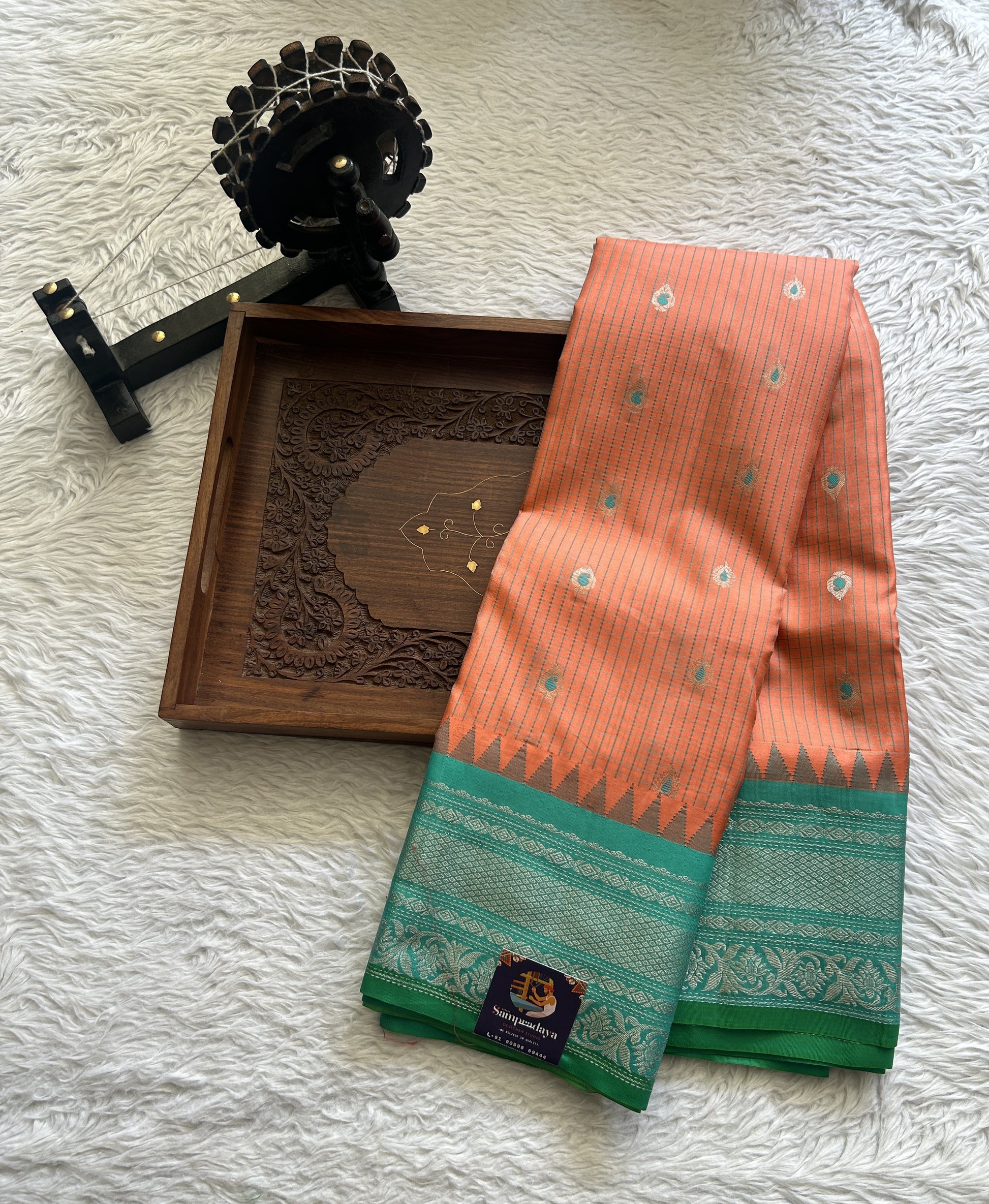 Gadwal Silk Saree Peach Colored complemented with a Sea Blue Color Zari Border. - Sampradaya Designer Studio