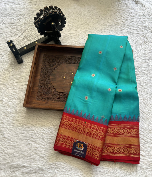 Gadwal Silk Saree Blue Colored complemented with a Red Color Zari Border. - Sampradaya Designer Studio