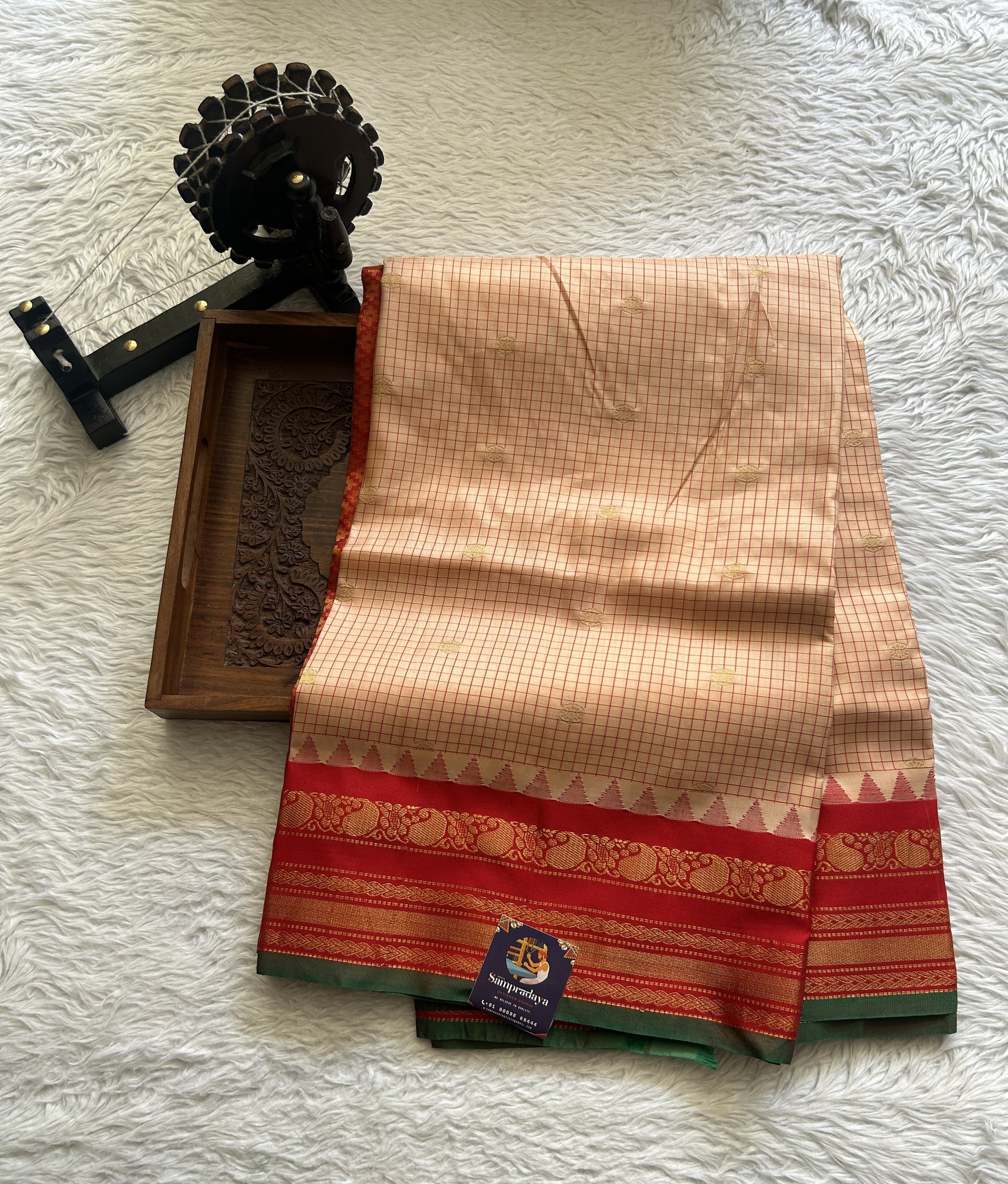 Gadwal Silk Saree Light Orange Colored complemented with a Red Color Zari Border. - Sampradaya Designer Studio