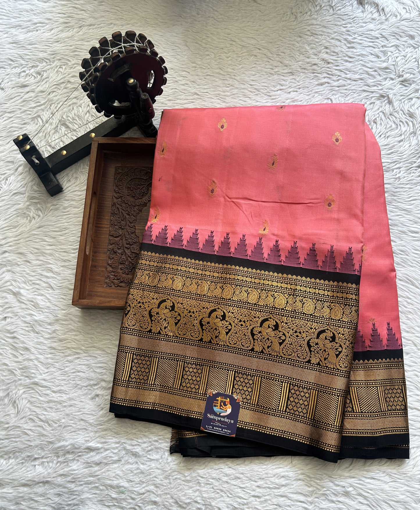 Gadwal Silk Saree Pink Colored complemented with a Black Color Zari Border. - Sampradaya Designer Studio