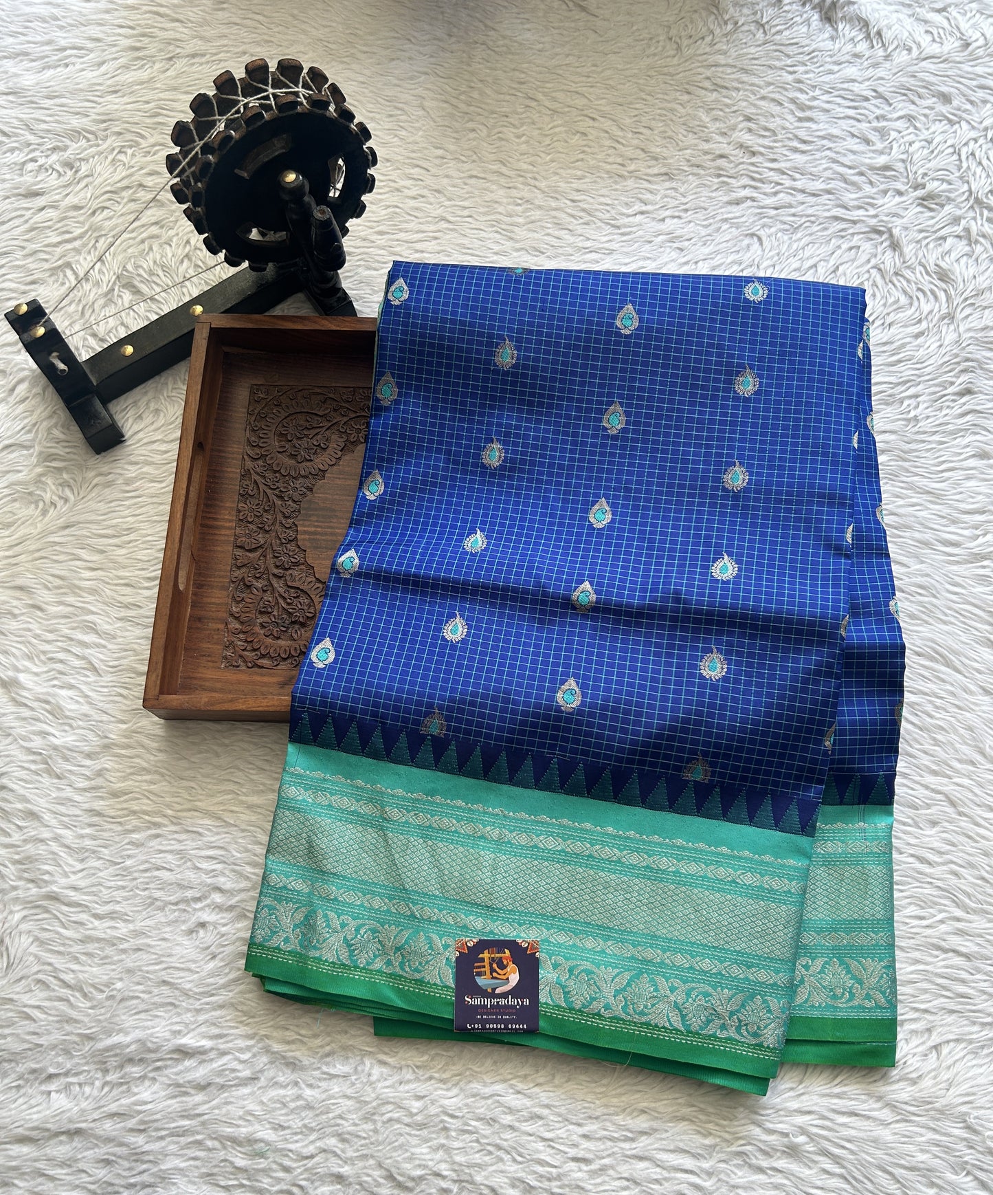 Gadwal Silk Saree Ink Blue Colored complemented with a Turquoise Blue Color Zari Border. - Sampradaya Designer Studio