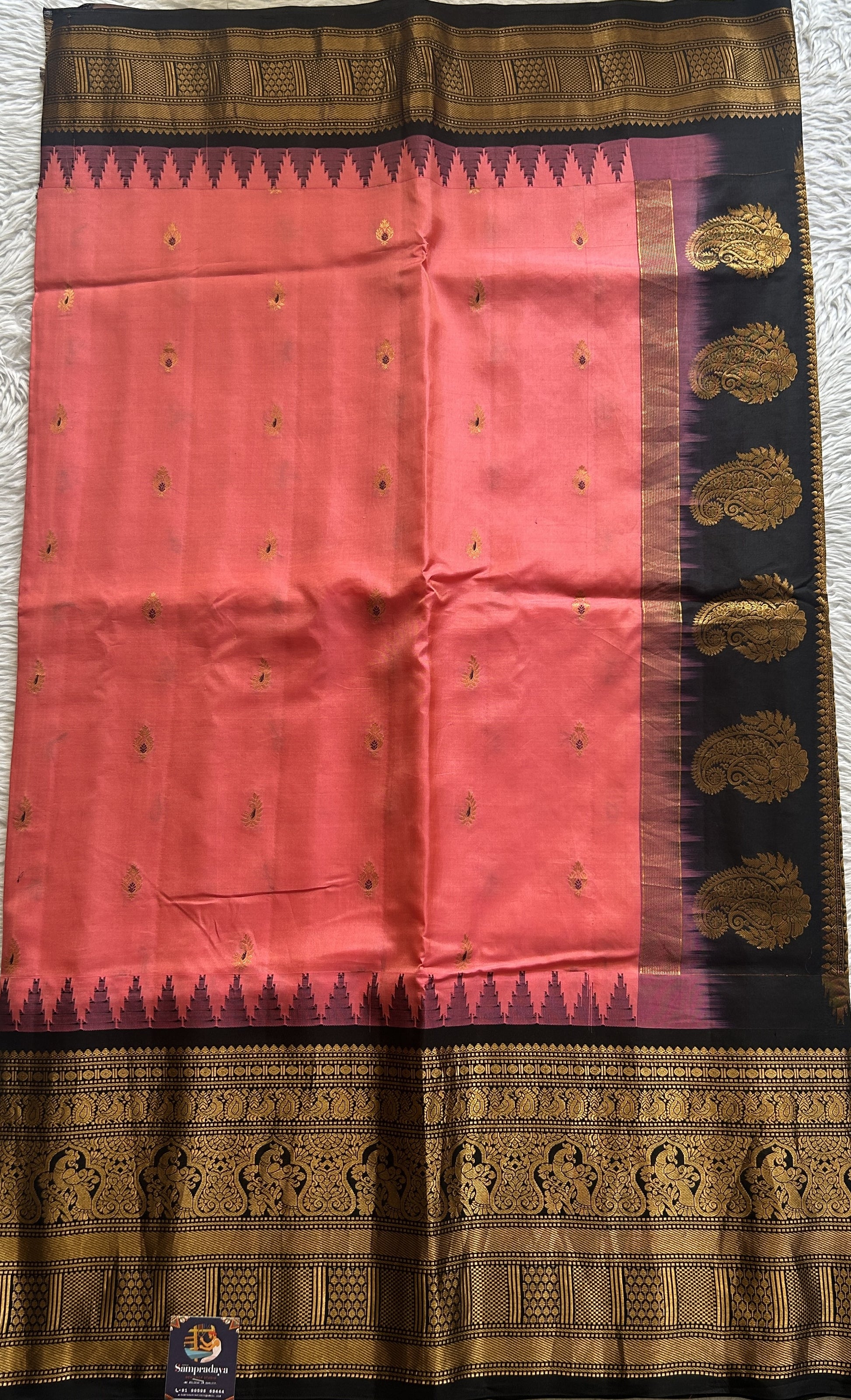 Gadwal Silk Saree Pink Colored complemented with a Black Color Zari Border. - Sampradaya Designer Studio