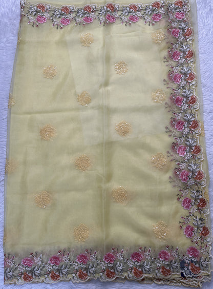 Soft Organza Designer Saree Light Yellow colored Saree complemented with a Machine Embroidery border. - Sampradaya Designer Studio