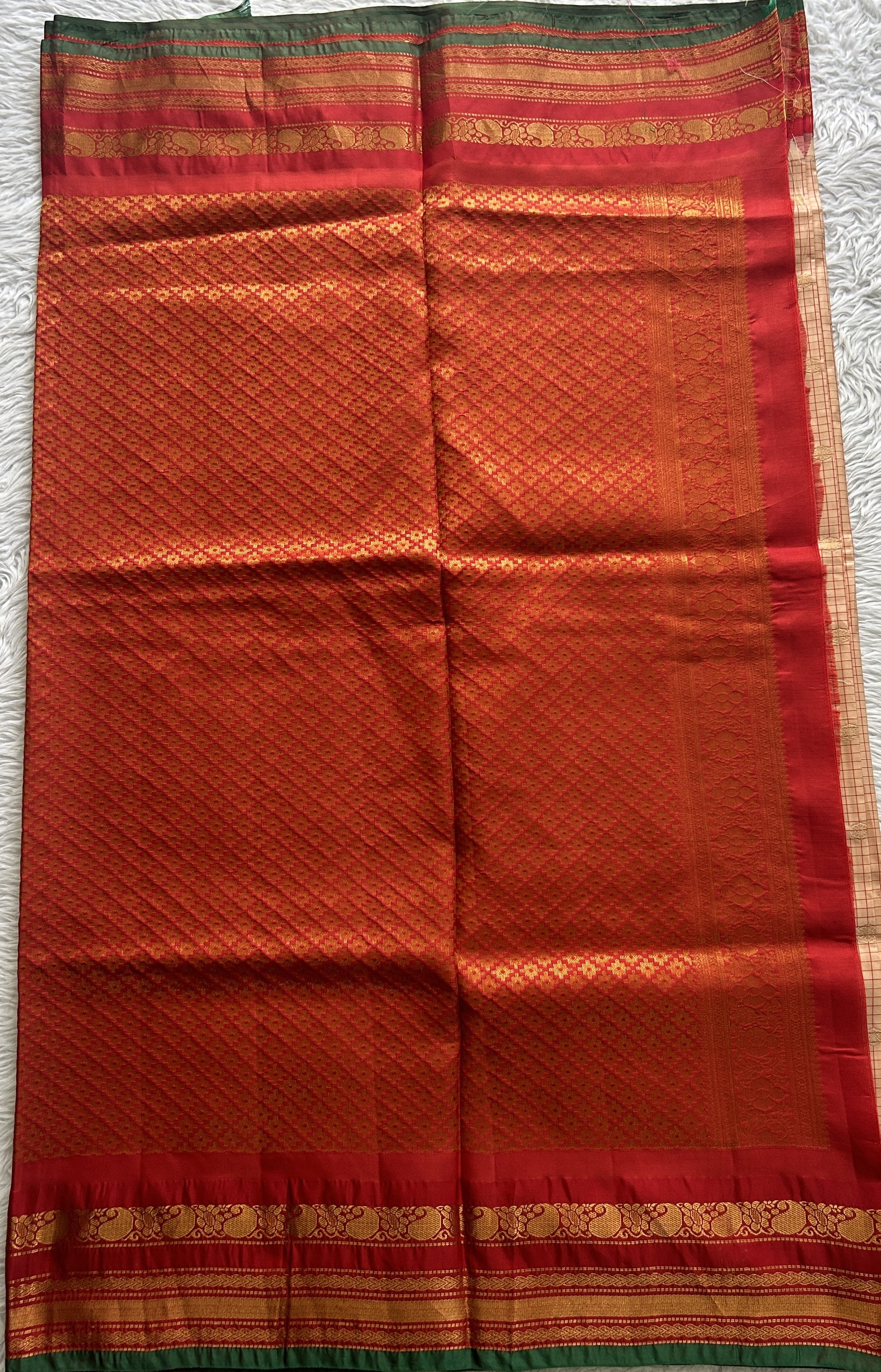 Gadwal Silk Saree Light Orange Colored complemented with a Red Color Zari Border. - Sampradaya Designer Studio