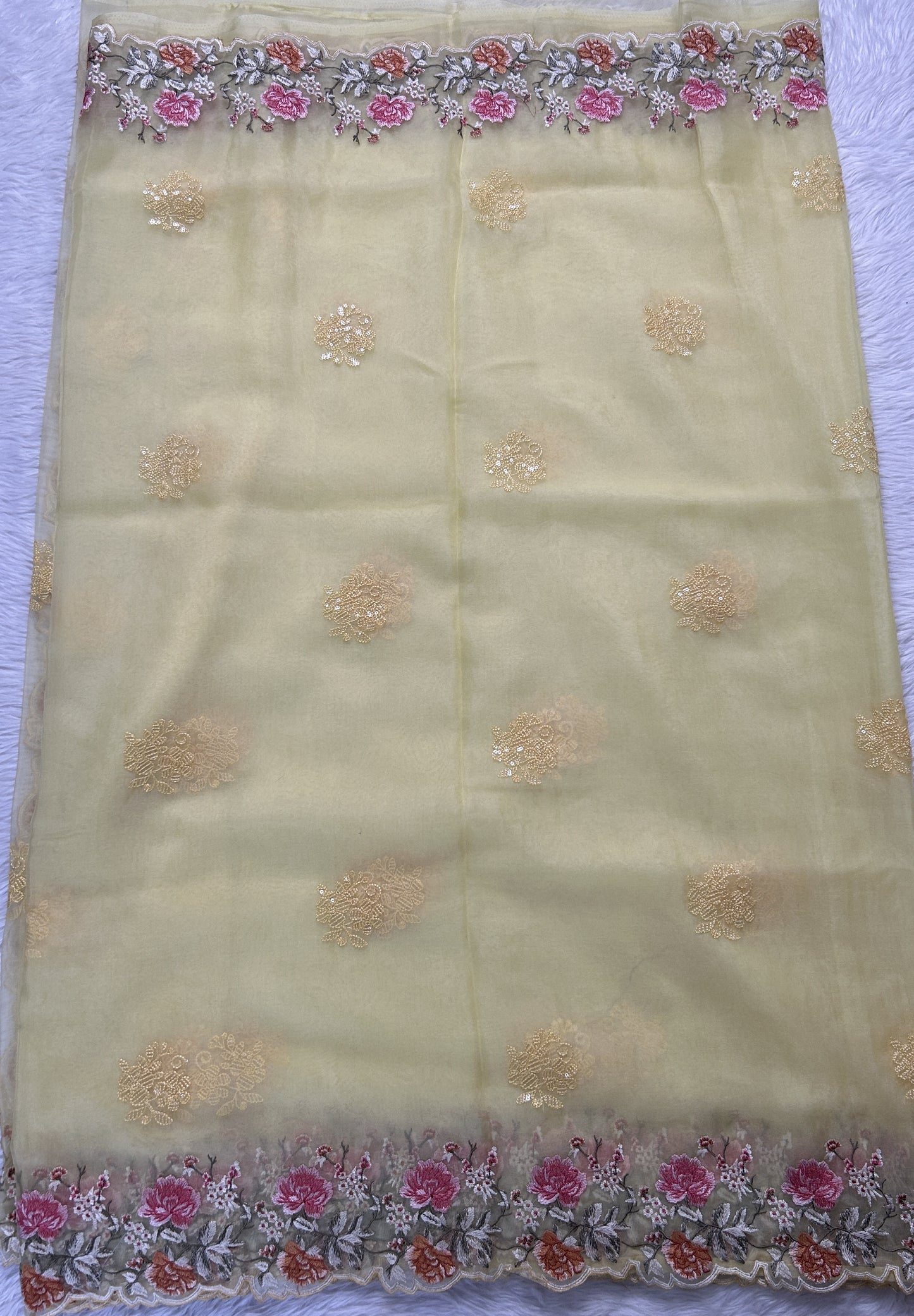 Soft Organza Designer Saree Light Yellow colored Saree complemented with a Machine Embroidery border. - Sampradaya Designer Studio