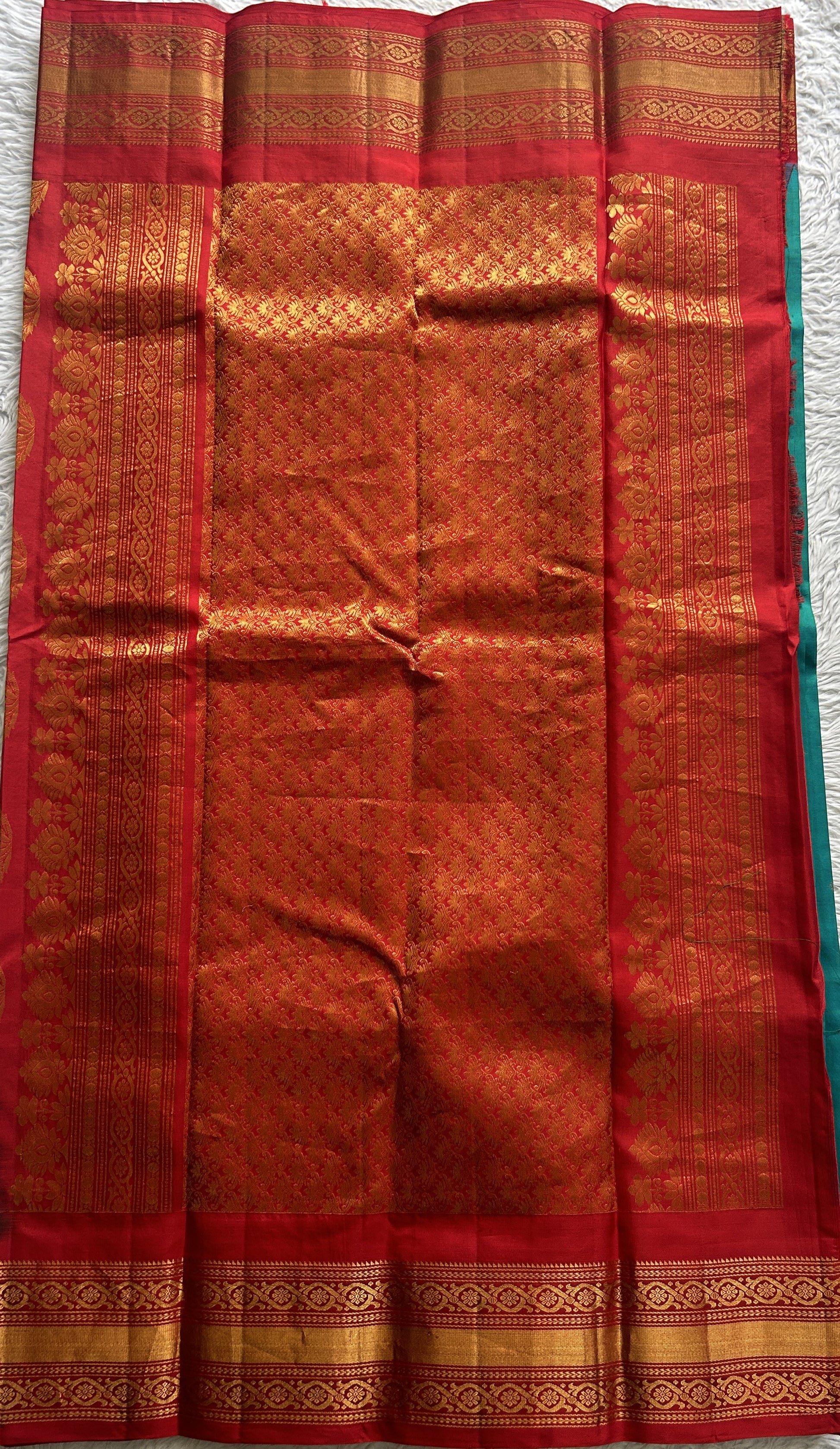 Gadwal Silk Saree Blue Colored complemented with a Red Color Zari Border. - Sampradaya Designer Studio