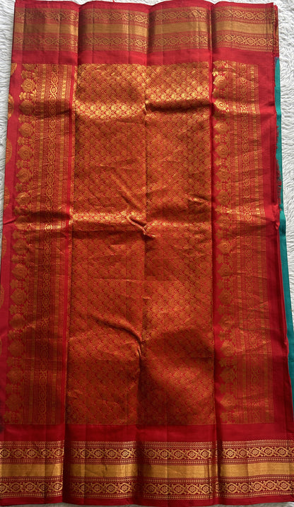 Gadwal Silk Saree Blue Colored complemented with a Red Color Zari Border. - Sampradaya Designer Studio